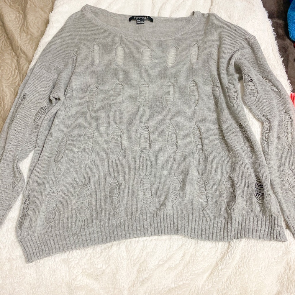 Forever 21 grey distressed knit sweater.